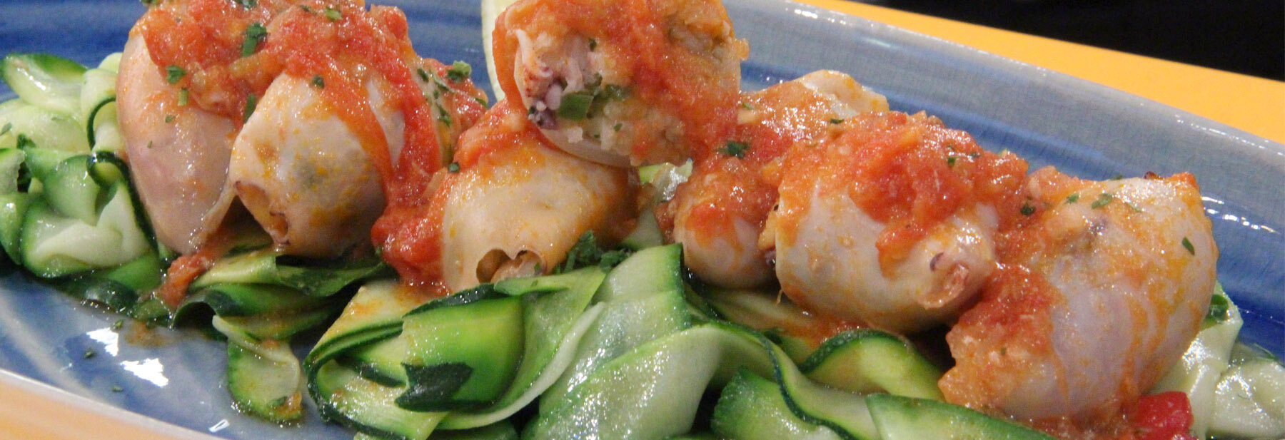 Lulas recheadas com arroz e camarão